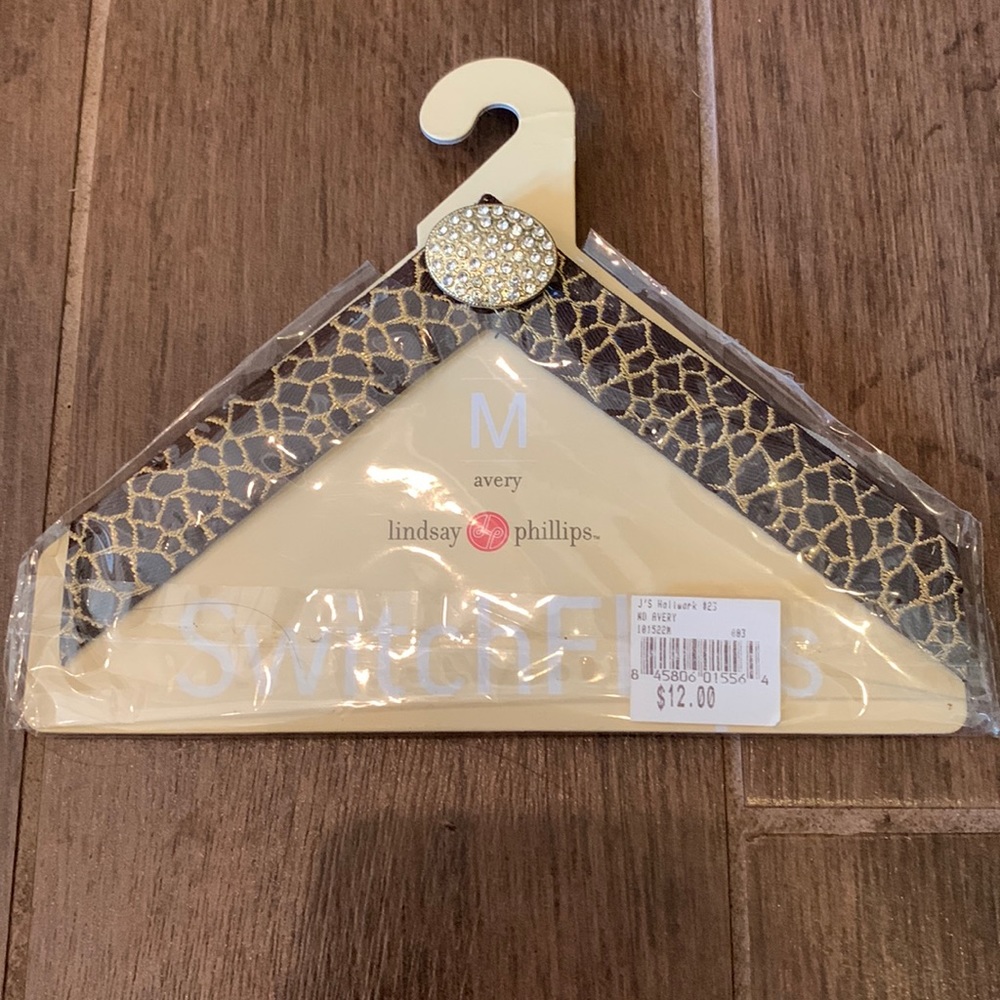 BRAND NEW pair of Lindsay Phillips SwitchFlops, “Avery” style. Size medium.